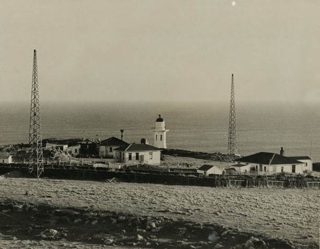 Lighthouse and cottages at Baring Head, Wellington. Dominion post (Newspaper): Photographic negatives and prints of the Evening Post and Dominion newspapers. Ref: EP-Transport-Shipping-Lighthouses-01. Alexander Turnbull Library, Wellington, New Zealand